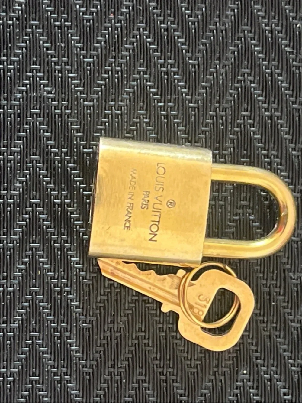 Louis Vuitton compact gold